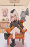  1girl absurdres ankle_boots armchair backpack bag black_footwear black_headwear black_jacket black_socks blue_eyes bookshelf boots bright_pupils chair commentary crossed_legs dress_shirt garrison_cap girls_und_panzer grey_hair hand_on_own_face hat highres indoors itsumi_erika jacket kumanoko_(xtakatox) kuromorimine_military_uniform kuromorimine_school_uniform long_sleeves looking_at_viewer medium_hair military_hat military_uniform miniskirt model_tank nishizumi_maho nishizumi_miho on_chair open_mouth picture_frame pleated_skirt poster_(object) red_shirt red_skirt school_uniform shirt sitting skirt smile smirk smug socks solo uniform white_pupils wing_collar 