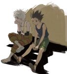  2boys black_hair black_tank_top brown_footwear brown_pants closed_mouth elbow_sleeve flip-flops frown full_body gon_freecss green_eyes green_shorts grey_footwear hand_on_own_chin highres hunter_x_hunter jewelry kgeroua killua_zoldyck male_focus multiple_boys necklace pants red_eyes sandals shadow short_hair shorts sitting spiked_hair tank_top white_background white_hair yellow_tank_top 