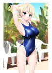  1girl absurdres arms_behind_head banana_tree blonde_hair blue_eyes blue_one-piece_swimsuit braid breasts chair commentary_request competition_swimsuit covered_navel cowboy_shot darjeeling_(girls_und_panzer) girls_und_panzer highres medium_breasts one-piece_swimsuit photo_background short_hair solo swimsuit takafumi twin_braids 