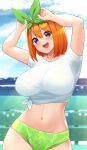  1girl :d arms_up bikini blue_eyes blue_sky blush breasts cloud commentary_request day go-toubun_no_hanayome green_bikini hair_between_eyes hair_ribbon highres horizon jampen large_breasts looking_at_viewer nakano_yotsuba ocean orange_hair outdoors ribbon shirt short_hair sky smile solo swimsuit t-shirt teeth tied_shirt upper_teeth_only white_shirt 