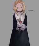  1boy 1girl absurdres black_dress blonde_hair dress hair_ornament highres holding holding_stuffed_toy lenore_lynchfast lenore_the_cute_little_dead_girl looking_at_viewer object_hug ragamuffin short_hair skull_hair_ornament stuffed_toy toukashi_(2tou9) 