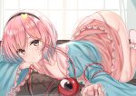  1girl ass black_hairband blue_shirt curtains eyeball hairband heart indoors kanikou komeiji_satori looking_at_viewer lying on_stomach panties pink_eyes pink_hair pink_panties shirt short_hair solo third_eye touhou underwear window 