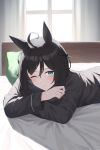  1girl absurdres ahoge alternate_costume anima_miko animal_ears bed bed_sheet black_hair black_pajamas blue_eyes blush closed_mouth commentary_request crossed_arms curtains ear_ornament eishin_flash_(umamusume) hair_between_eyes highres horse_ears horse_girl lying messy_hair on_bed on_stomach pajamas pillow short_hair smile solo umamusume upper_body 