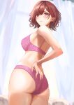  1girl bra brown_hair closed_mouth cowboy_shot curtains from_behind hand_on_own_hip highres higuchi_madoka idolmaster idolmaster_shiny_colors indoors looking_at_viewer looking_back mole mole_under_eye panties purple_bra purple_eyes purple_panties short_hair solo underwear underwear_only ushimo_(dztu8434) window 