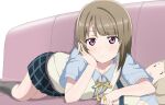  1girl asymmetrical_hair blunt_bangs blush bob_cut closed_mouth collarbone commentary couch hand_on_own_cheek hand_on_own_face head_rest light_brown_hair looking_at_viewer love_live! love_live!_nijigasaki_high_school_idol_club lying nakasu_kasumi nijigasaki_academy_school_uniform on_couch on_side purple_eyes school_uniform short_hair stuffed_toy tottsan vest yellow_vest 