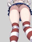  1girl absurdres ass ass_focus black_panties blue_skirt commentary_request conte_di_cavour_(kancolle) cosplay elbow_gloves feet_out_of_frame from_below gloves grey_background hands_on_own_hips head_out_of_frame highres kantai_collection panties pleated_skirt shimakaze_(kancolle) shimakaze_(kancolle)_(cosplay) simple_background skirt solo striped striped_thighhighs thighhighs thong torisan underwear white_gloves 