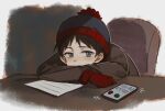  1boy animification beanie black_hair blue_eyes brown_jacket cellphone crossed_arms english_commentary english_text fur_hat gloves hat highres jacket male_child male_focus on_chair paper pen phone red_gloves sketch smartphone solo south_park stan_marsh starmango524 
