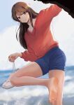  1girl absurdres alternate_costume arm_up bare_legs barefoot blue_shorts blurry blurry_background blush brown_eyes brown_hair closed_mouth depth_of_field feet ghhoward highres holding legs long_hair long_sleeves looking_at_viewer no_shoes outdoors red_shirt sakurajima_mai seishun_buta_yarou shirt shoes shoes_removed short_shorts shorts sneakers soles solo splashing standing standing_on_one_leg thighs toes variant_set water wet 