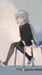  1girl a.k.a.zkin ahoge arm_at_side assault_lily black_cardigan black_skirt black_thighhighs blue_eyes blue_footwear blush cardigan chair closed_mouth collared_shirt commentary feet_up from_side full_body grey_hair hair_between_eyes highres indoors kanabako_misora long_hair looking_ahead low_twintails mary_janes miniskirt neck_ribbon on_chair pleated_skirt purple_ribbon ribbon school_uniform shirt shoe_dangle shoes sitting skirt solo thighhighs twintails two-tone_footwear white_footwear white_shirt yurigaoka_girls_academy_school_uniform zettai_ryouiki 