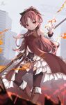  1girl black_thighhighs blurry boots building depth_of_field fire grey_sky hair_ribbon high_ponytail highres holding holding_polearm holding_weapon knee_boots long_hair looking_at_hand magical_girl mahou_shoujo_madoka_magica pleated_skirt polearm pyrokinesis red_eyes red_hair ribbon sakura_kyoko signature skirt sky skyscraper solo soul_gem standing taka.yana thighhighs very_long_hair weapon 