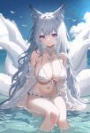  1girl :o absurdres animal_ear_fluff animal_ears azur_lane bikini blue_sky breasts cloud commentary_request day detached_sleeves fox_ears fox_girl fox_tail frilled_bikini frills front-tie_bikini_top front-tie_top grey_hair highres large_breasts large_tail light_blush long_hair looking_at_viewer multiple_tails navel ocean official_alternate_costume outdoors parted_lips purple_eyes shinano_(azur_lane) shinano_(dreamy_white_sands)_(azur_lane) sitting sky solo stomach sunlight swimsuit tail usagi_(786113654) very_long_hair water white_bikini 