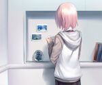  1girl aki_(neyuki41028) black_pants book facing_away fate/grand_order fate_(series) holding holding_photo hood hoodie looking_at_object mash_kyrielight pants photo_(object) pink_hair shadow shelf short_hair solo white_hoodie 