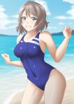  1girl beach blue_eyes blue_one-piece_swimsuit blush breasts brown_hair cloud cloudy_sky collarbone competition_swimsuit day grey_hair highres looking_at_viewer love_live! love_live!_sunshine!! medium_breasts ocean one-piece_swimsuit outdoors sand sano_souichi short_hair sky smile solo swimsuit watanabe_you water 