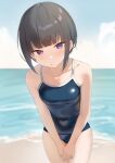  1girl beach black_hair blue_one-piece_swimsuit blue_sky blunt_bangs blush breasts cloud day highres leaning_forward looking_at_viewer male_focus ocean one-piece_swimsuit original outdoors parted_lips purple_eyes sakieko short_hair sky solo swimsuit water 