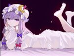  1girl barefoot black_background closed_mouth commentary_request crescent crescent_hat_ornament dress falken_(yutozin) from_side hat hat_ornament long_hair looking_at_viewer lying mob_cap on_stomach patchouli_knowledge purple_eyes purple_hair sidelocks simple_background solo the_pose touhou white_dress white_headwear 