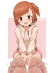 1girl aomoro artist_name barefoot blurry blurry_foreground blush border brown_eyes brown_hair brown_hoodie character_request commentary copyright_request depth_of_field feet foot_focus foreshortening hands_on_own_thighs high-waist_shorts highres hood hood_down hoodie legs_together long_sleeves looking_at_viewer medium_hair motion_lines on_ground one_side_up open_mouth parted_bangs pink_background pink_shorts shorts sitting smile soles solo symbol-only_commentary teeth toes upper_teeth_only white_border 