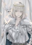  1boy absurdres blanca_(fate) blue_eyes bug butterfly cloak crown diamond_hairband fate/grand_order fate_(series) fur-trimmed_cloak fur_trim grey_hair hand_on_own_face highres long_sleeves male_focus medium_hair moth no_wings noraillust oberon_(fate) upper_body white_cloak 