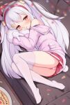  absurdres ass azur_lane birthday_cake blurry blush cake christmas_lights couch depth_of_field fetal_position food food_on_face hairband happy_birthday head_tilt highres indoors irokari jacket laffey_(azur_lane) lying on_couch on_side panties pink_jacket plate red_eyes red_skirt skirt striped striped_panties thighhighs underwear white_hair white_thighhighs zettai_ryouiki 