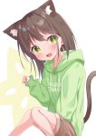  1girl animal_ear_fluff animal_ears blush borrowed_character brown_hair brown_shorts cat_ears cat_girl cat_tail commentary drawstring extra_ears fang feet_out_of_frame green_eyes green_hoodie highres hood hoodie knees_together_feet_apart long_hair long_sleeves looking_at_viewer matchanear okura-chan_(at_nya5)_(character) open_mouth original paw_pose puffy_long_sleeves puffy_sleeves short_shorts shorts sitting skin_fang sleeves_past_wrists solo star-shaped_pupils star_(symbol) symbol-shaped_pupils tail 