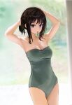  1girl arms_up bare_legs bare_shoulders black_hair blue_eyes blurry blurry_background breasts cleavage closed_mouth commentary cowboy_shot green_one-piece_swimsuit hair_tie_in_mouth hands_in_hair highres looking_afar medium_breasts medium_hair mouth_hold one-piece_swimsuit original ponytail sidelocks soi_iii solo strapless strapless_swimsuit swimsuit tying_hair wet wet_hair 