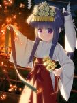  1girl arm_up bell blue_hair blunt_bangs blush bow closed_mouth commentary_request fire flower furude_rika gaou_(babel) hakama hakama_skirt headpiece higurashi_no_naku_koro_ni holding holding_instrument instrument japanese_clothes jingle_bell kagura_suzu kimono long_hair miko night outdoors ponytail purple_eyes red_bow red_hakama shide sidelocks skirt solo v-shaped_eyebrows very_long_hair white_flower white_kimono 