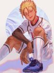  1boy :p ball blonde_hair blue_footwear blue_lock character_name collared_shirt commentary dark-skinned_male dark_skin highres knees_up kshima_mo369 long_sleeves looking_at_viewer male_focus purple_eyes shidou_ryuusei shirt shoes shorts sitting soccer_ball soccer_uniform solo sportswear tongue tongue_out tsurime white_background white_shirt white_shorts 