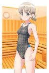  1girl absurdres aki_(girls_und_panzer) blush breasts collarbone commentary_request competition_swimsuit cowboy_shot girls_und_panzer green_eyes grey_one-piece_swimsuit groin highres houndstooth light_brown_hair looking_at_viewer low_twintails one-piece_swimsuit sauna short_hair short_twintails small_breasts smile solo standing swimsuit takafumi thighs twintails two-tone_swimsuit variant_set 