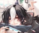  1boy animal_hood barefoot bedroom black_hair blue_eyes cat_hood closed_mouth controller game_controller happy heterochromia highres hood hood_down hoodie indoors lips original red_eyes sangonosyokudai smile solo sweater white_hair 