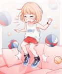  1girl ball basketball_(object) blonde_hair blue_eyes blush child collarbone commentary commission couch dolphin_shorts english_commentary female_child full_body highres indoors monchichiwa open_mouth original red_shorts shoes short_hair shorts sneakers solo tank_top tennis_ball variant_set watch white_tank_top wristwatch 