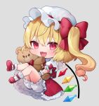  1girl :3 :d blonde_hair bloomers blush chibi crystal fang flandre_scarlet full_body grey_background highres holding holding_stuffed_toy legs_up looking_at_viewer one_side_up open_mouth puffy_short_sleeves puffy_sleeves red_eyes red_skirt red_vest short_hair short_sleeves skirt smile solo stuffed_animal stuffed_toy teddy_bear touhou underwear usushio vest wings wrist_cuffs 
