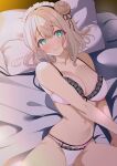  1girl absurdres azur_lane bed black_trim blonde_hair bra from_above green_eyes highres lace-trimmed_bra lace-trimmed_panties lace_trim lingerie looking_at_viewer lying maid_headdress manchester_(azur_lane) on_back on_bed origami_aya panties pillow pink_bra pink_panties star-shaped_pupils star_(symbol) symbol-shaped_pupils underwear underwear_only 