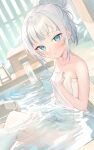  1girl :o bathing blue_eyes blue_hair blush bucket collarbone commentary_request dutch_angle fins fish_tail gawr_gura hair_bun highres hololive hololive_english knees_up looking_at_viewer multicolored_hair naked_towel onsen parted_lips partially_submerged shark_girl shark_tail sidelocks single_hair_bun sitting solo streaked_hair tail takumi11 towel virtual_youtuber water wet white_hair wooden_bucket 