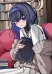  1girl absurdres blue_archive blush book book_stack bookshelf cardigan hairband halo highres jewelry long_hair looking_at_viewer necklace off_shoulder parted_lips purple_eyes purple_hair san_(harutuki_3) school_uniform serafuku solo ui_(blue_archive) 