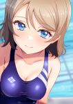  1girl blue_eyes blue_one-piece_swimsuit blush breasts brown_hair competition_swimsuit grey_hair highres lips looking_at_viewer love_live! love_live!_sunshine!! medium_breasts one-piece_swimsuit pool short_hair sikamiya smile solo swimsuit watanabe_you water 