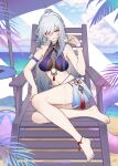  1girl ball bare_arms bare_legs bare_shoulders barefoot beach_chair beachball blue_sky breasts cloud commentary_request day grey_hair grin highres honkai:_star_rail honkai_(series) jingliu_(honkai:_star_rail) long_hair looking_at_viewer medium_breasts nail_polish navel red_eyes sitting sky smile solo stomach thighs toenail_polish toenails very_long_hair yunkaiming 