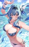  1girl arm_up bare_shoulders bikini black_hairband blue_bikini blue_hair blue_sky blush breasts cleavage closed_mouth collarbone eula_(genshin_impact) genshin_impact hair_ornament hairband highres large_breasts looking_at_viewer medium_hair navel ocean purple_eyes raijuu_(bakanara) sidelocks sky smile snowflakes solo stomach swimsuit water wet yellow_eyes 