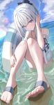  1girl absurdres bare_arms bare_shoulders blue_archive blue_halo blush day frilled_one-piece_swimsuit frills grey_hair guree_(haiiro) halo highres innertube long_hair looking_at_viewer miyako_(blue_archive) miyako_(swimsuit)_(blue_archive) ocean off-shoulder_one-piece_swimsuit off_shoulder official_alternate_costume one-piece_swimsuit outdoors parted_lips ponytail purple_eyes sandals solo swimsuit toes water 