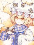  1girl blonde_hair cat chen chen_(cat) closed_mouth commentary_request fox_tail hands_in_opposite_sleeves hat highres kitsune mob_cap multiple_tails ro.ro short_hair simple_background smile tail touhou upper_body white_headwear yakumo_ran yellow_background yellow_eyes 