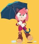  1girl amy_rose blush boots brown_footwear coat gloves green_eyes highres holding holding_umbrella looking_at_viewer pink_coat puddle simple_background solo sonic_(series) steffybs umbrella white_gloves yellow_background 
