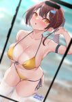  1girl :o arm_strap arm_up beach bikini blurry blurry_background blush breasts brown_hair chinese_commentary cleavage collarbone dated gold_bikini hair_ornament hairclip highres ineedu041_tako large_breasts navel open_mouth original ponytail signature skindentation solo stomach strap_gap swimsuit thigh_gap thighhighs white_thighhighs yellow_eyes 