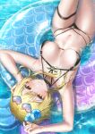  1girl absurdres bare_shoulders bikini blonde_hair blush breasts chumugi cleavage collarbone flower genshin_impact hair_flower hair_ornament highres large_breasts looking_at_viewer lumine_(genshin_impact) navel sidelocks solo swimsuit thighs yellow_eyes 