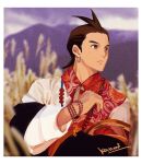  1boy ace_attorney antenna_hair apollo_justice artist_name bead_bracelet bead_necklace beads border bracelet brown_eyes brown_hair closed_mouth collared_shirt earrings forked_eyebrows frown highres jewelry kanmi_(kanmiland) long_sleeves male_focus necklace outdoors print_shirt red_shirt shirt short_hair sleeve_cuffs solo traditional_clothes two-tone_shirt upper_body white_border white_shirt 