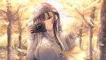  1girl absurdres autumn autumn_leaves black_hair blunt_bangs blush camera ch13 grey_eyes grey_hair grey_headwear grey_sweater highres holding holding_camera hololive hololive_dev_is juufuutei_raden long_hair looking_at_viewer sidelocks smile solo sweater virtual_youtuber waving 