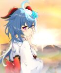  1girl alternate_costume blue_hair blurry chinese_clothes commentary_request depth_of_field flower from_behind ganyu_(genshin_impact) genshin_impact goat_horns hair_between_eyes hair_flower hair_ornament highres horns long_hair long_sleeves looking_at_viewer looking_back miru_(hvrs4548) mountainous_horizon purple_eyes sidelocks smile solo sunlight sunrise wide_sleeves 