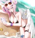 1girl absurdres alternate_costume beach bikini black_bikini blue_archive blush breasts cleavage dana_(hapong07) double_bun eyewear_on_head feathered_wings hair_bun halo highres holding holding_phone large_breasts looking_at_phone lying mika_(blue_archive) mouth_hold on_side phone pink_hair sidelocks string_bikini sunglasses swimsuit thigh_strap white_wings wings 