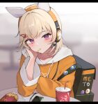  1girl animal_ear_headphones animal_ears backpack bag blonde_hair blurry blurry_background chips_(food) coca-cola drawstring eating elbow_rest facial_mark fake_animal_ears food french_fries hair_ornament hairclip hand_on_own_cheek hand_on_own_face head_rest headphones highres hood hoodie jacket komori_met long_sleeves looking_at_viewer mcdonald&#039;s medium_hair mouth_hold nomo_(no_mo) orange_hoodie purple_eyes solo swept_bangs triangle_facial_mark virtual_youtuber vspo! white_hood 