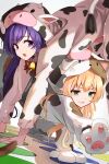  2girls all_fours animal_costume animal_hands blonde_hair blurry cat_costume clenched_teeth commentary_request cosplay cow_costume depth_of_field dutch_angle eyelashes frown gloves green_eyes hair_between_eyes highres hood hood_up jitome kigurumi light_blush long_hair long_sleeves looking_at_another looking_to_the_side mizuori_shizuku multiple_girls open_mouth paw_gloves purple_eyes purple_hair simple_background smile summer_pockets tagame_(tagamecat) teeth tsumugi_wenders twister v-shaped_eyebrows white_background 
