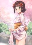  1girl absurdres amami_haruka b1ack_illust blunt_bangs blush brown_hair cherry_blossoms clothes_lift floral_print hair_ribbon highres idolmaster idolmaster_(classic) idolmaster_million_live! japanese_clothes kimono kimono_lift looking_at_viewer obi outdoors pink_kimono ribbon rock sash smile solo wading 