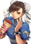  1girl :p blue_dress bracelet brown_eyes brown_hair bun_cover china_dress chinese_clothes chun-li closed_mouth commentary_request crepe double_bun dress earrings eyelashes food fruit hair_bun highres jewelry one_eye_closed short_hair signature simple_background solo spiked_bracelet spikes star_(symbol) strawberry street_fighter tongue tongue_out white_background yora 