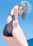  1girl adjusting_clothes adjusting_swimsuit animal_ear_fluff animal_ears ass back blue_archive blue_eyes blue_halo blue_one-piece_swimsuit blue_sky breasts commentary_request cross cross_hair_ornament dutch_angle from_behind grey_hair hair_ornament halo inverted_cross leaning_forward long_hair looking_at_viewer looking_back mattaku_mousuke official_alternate_costume one-piece_swimsuit outdoors ponytail shiroko_(blue_archive) shiroko_(swimsuit)_(blue_archive) sidelocks sky small_breasts solo swimsuit thighs 
